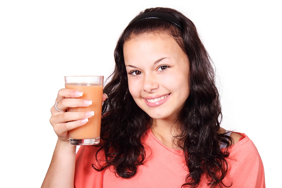 A women showing her drink