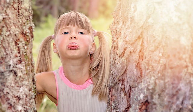 A kid making a face 