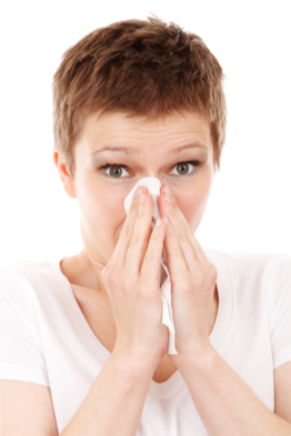 A women covering her nose