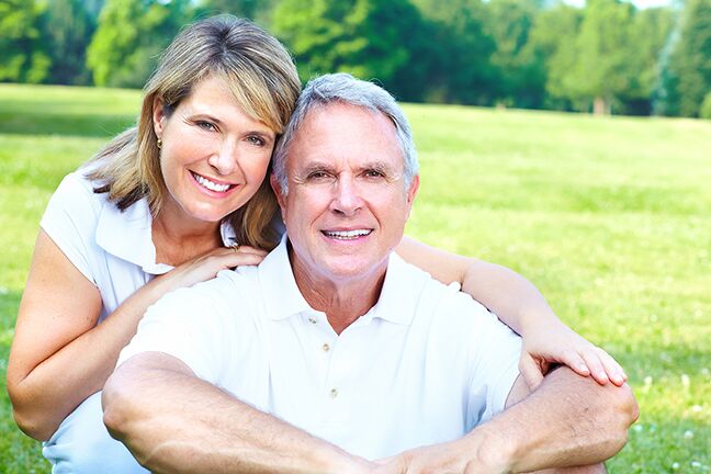 Old couple sitting together