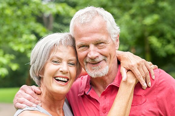 Old couple smiling